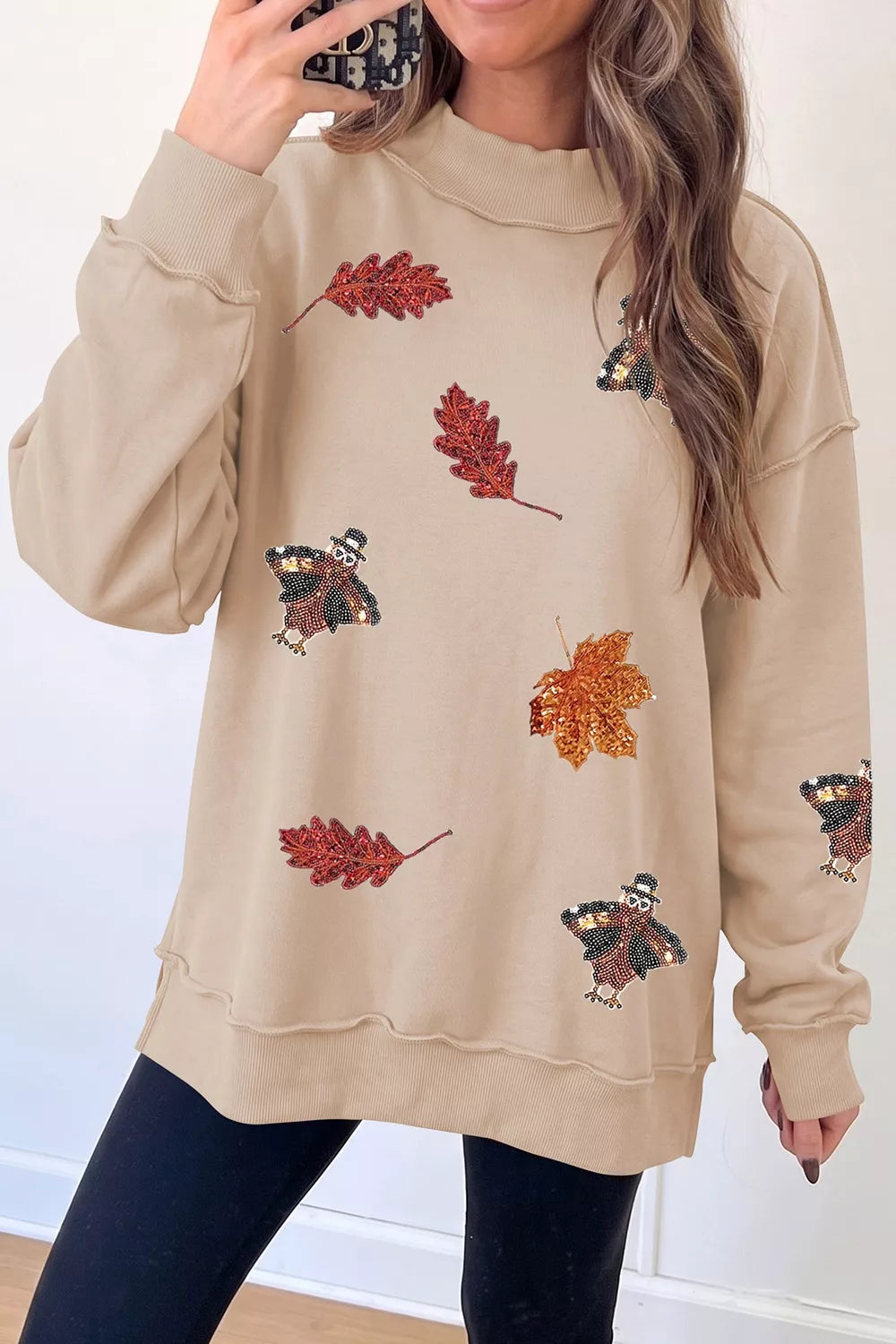 Sequin Turkey Leaf Graphic Exposed Seam Mock Neck Sweatshirt | STAHlin RADIANCE