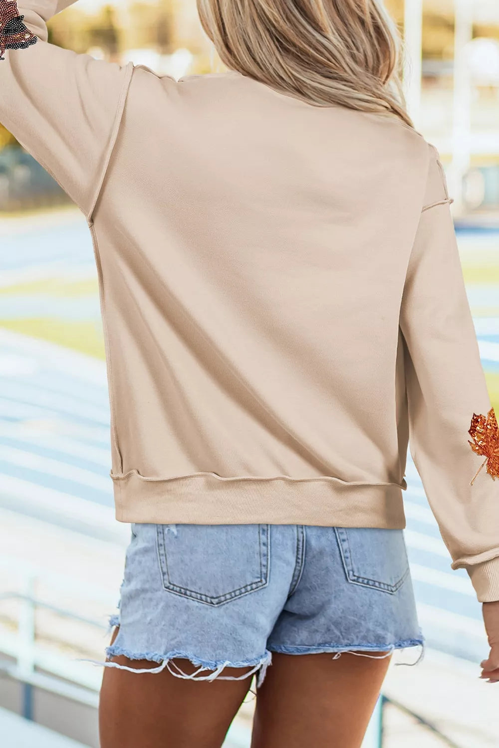 Sequin Turkey Leaf Graphic Exposed Seam Mock Neck Sweatshirt | STAHlin RADIANCE